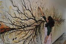 Rohini Devasher working on the mural Parts Unknown (June 2012)