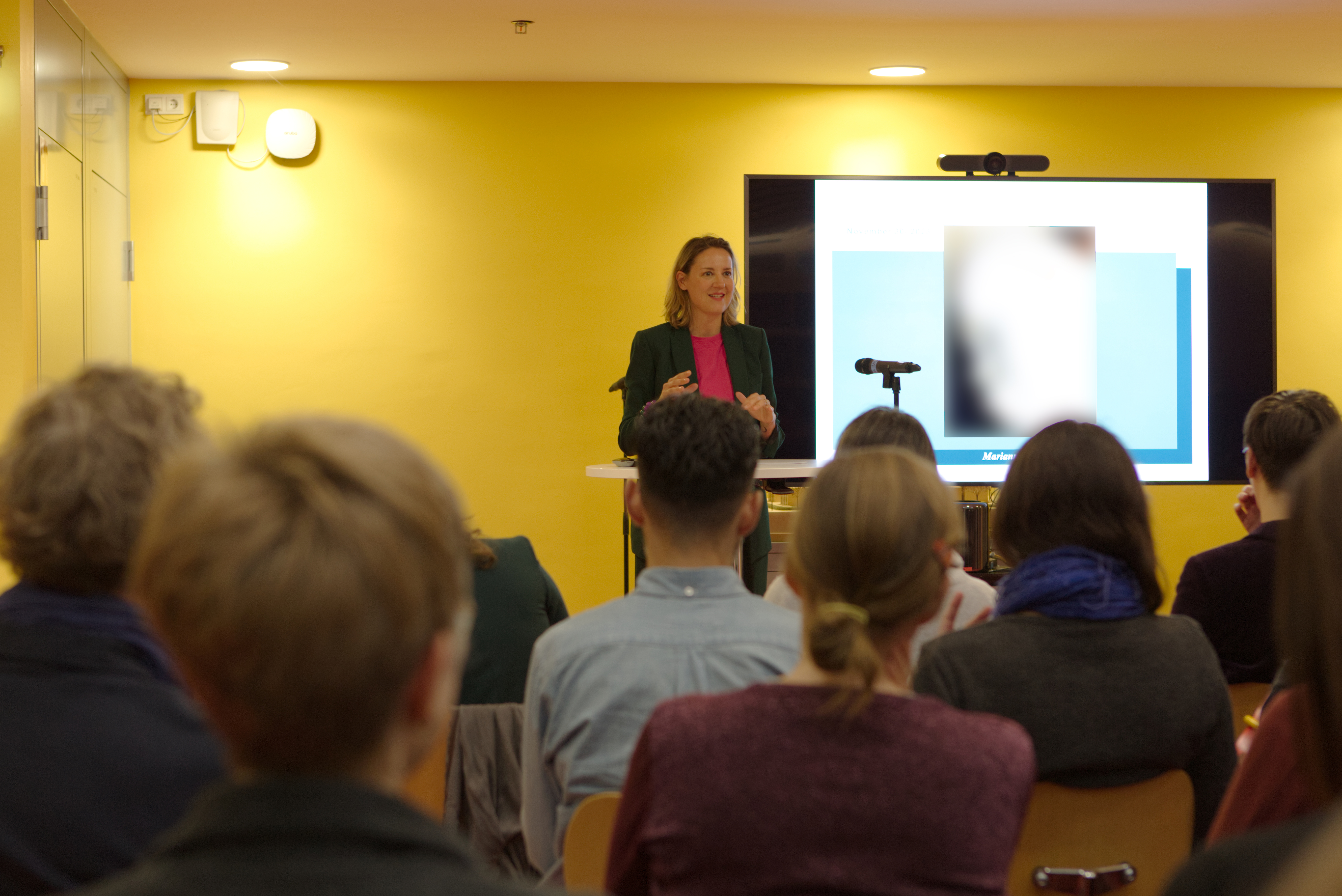 Esther Chen hosting Publications Slam