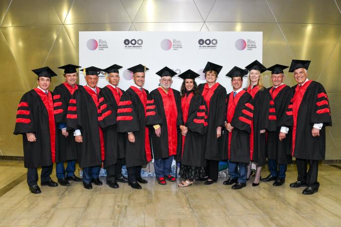 Recipients of Honorary Degrees pose in their ceremonial robes