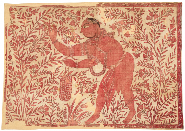 herb picker in ceremonial cloth in red