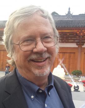 Stephen R. Bokenkamp in front of an architectural structure