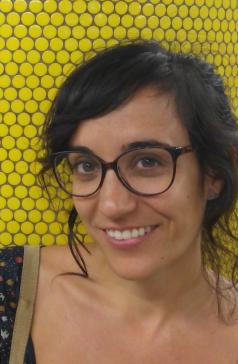 Julia Sanchez-Dorado at a yellow-dotted column 