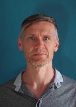 portrait of Christoph rosol (blue background)