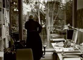 Peter Damerow standing in his office.