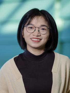profile picture of Jing Wang, blue-green background