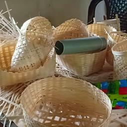 half made bamboo baskets on table