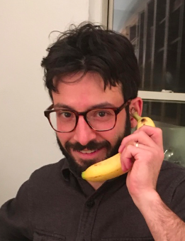 profile picture of Abram Kaplan holding a banana and pretend it's a phone