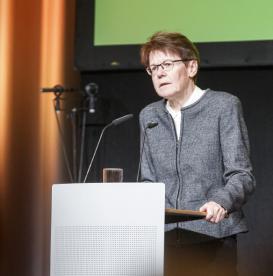 Doris Kaufmann standing at a lectern