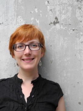 Kerstin Pannhorst in front of a concrete wall